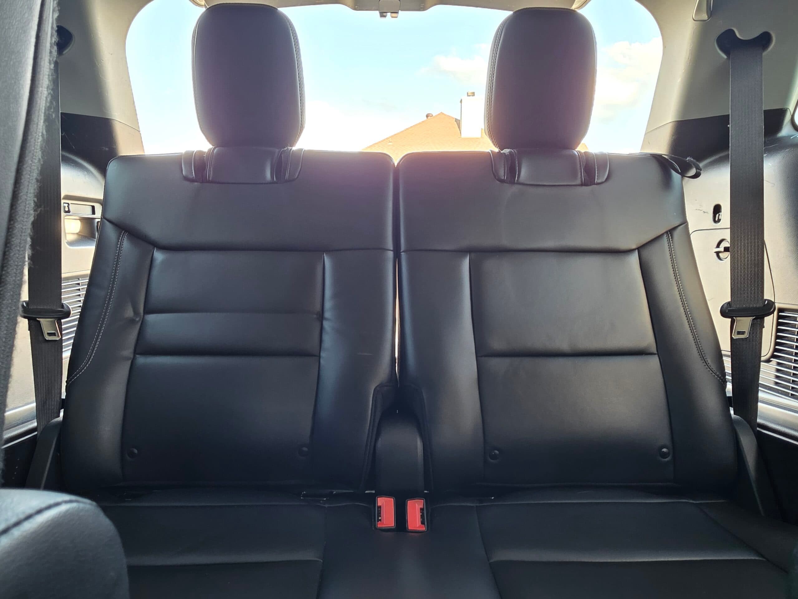 Clean black leather rear seats after interior detailing